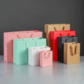 Offset Printed Reusable & Recyclable Kraft Paper Bag with Handles for Cosmetics Shopping for Clothing and Shoes