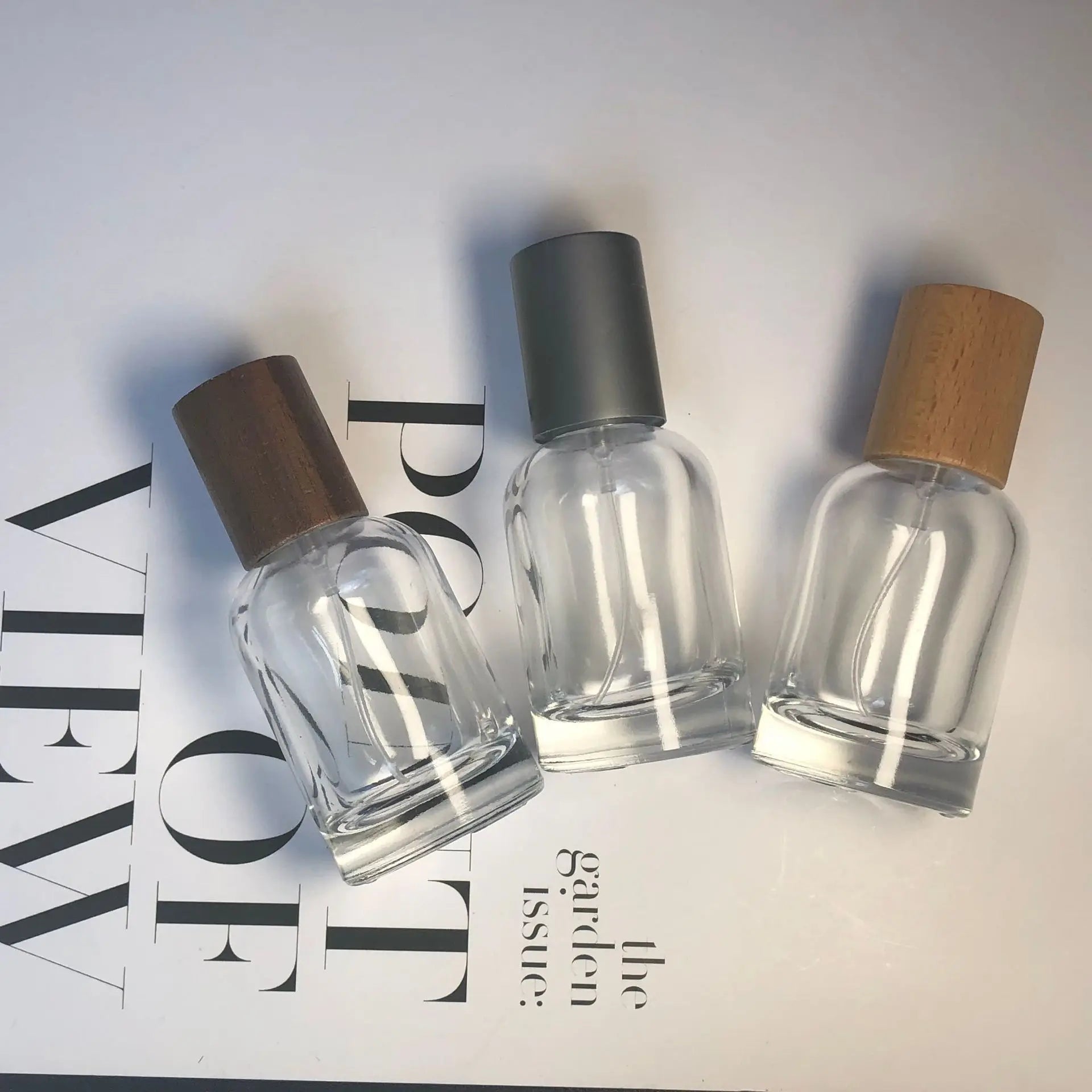 Luxury Design 50ml Square Glass Empty Refillable Spray Beautiful Perfume Bottle with Wooden Lid