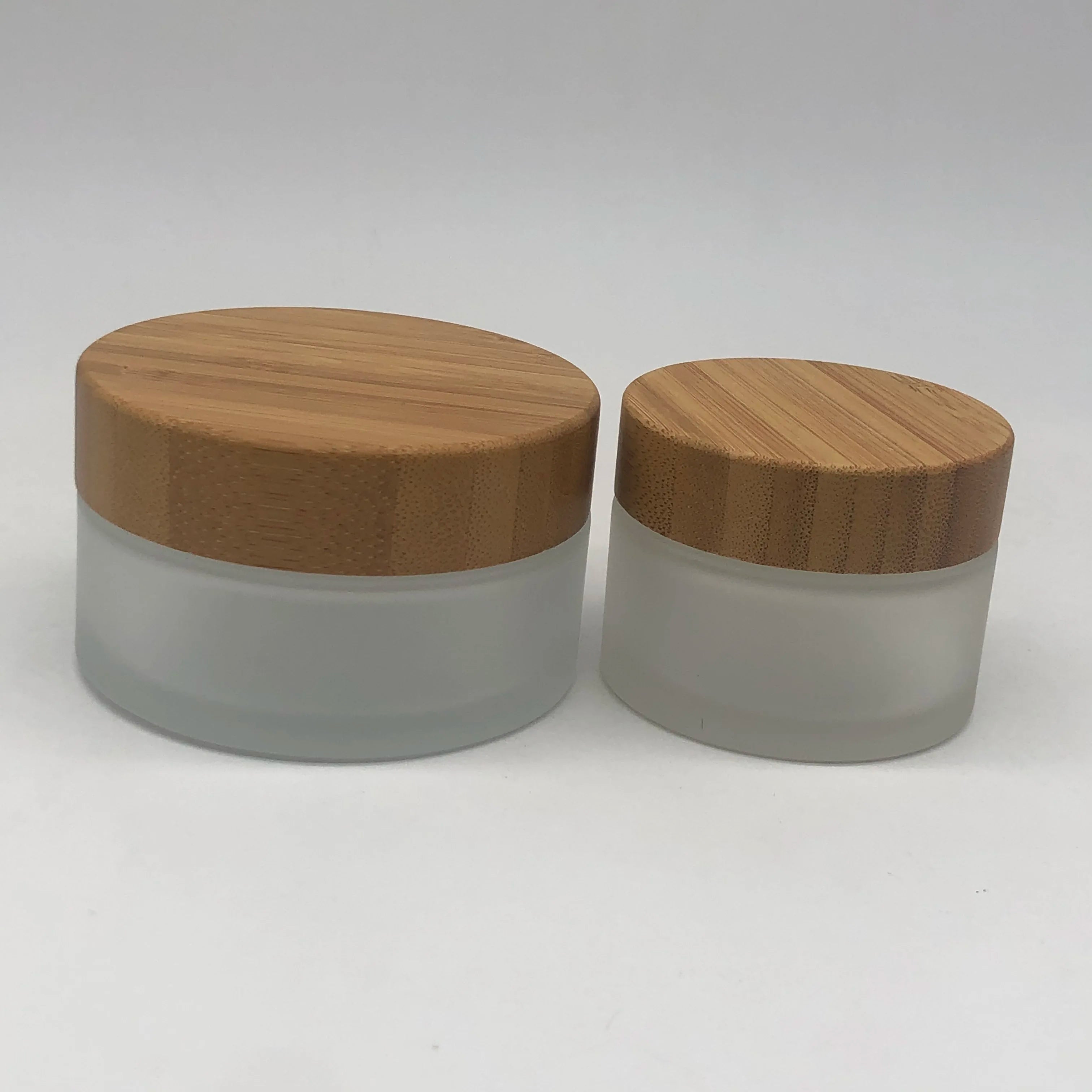Factory 100ml Round Frosted  Cosmetic Natural Bamboo Lid Glass  Jar with Natural Bamboo Cover for Cream