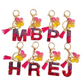 Hot Selling Mixed Color Shiny 26 English Letter Drop Glue First Letter Keychain Pendant butterfly Tassel Resin Keychain