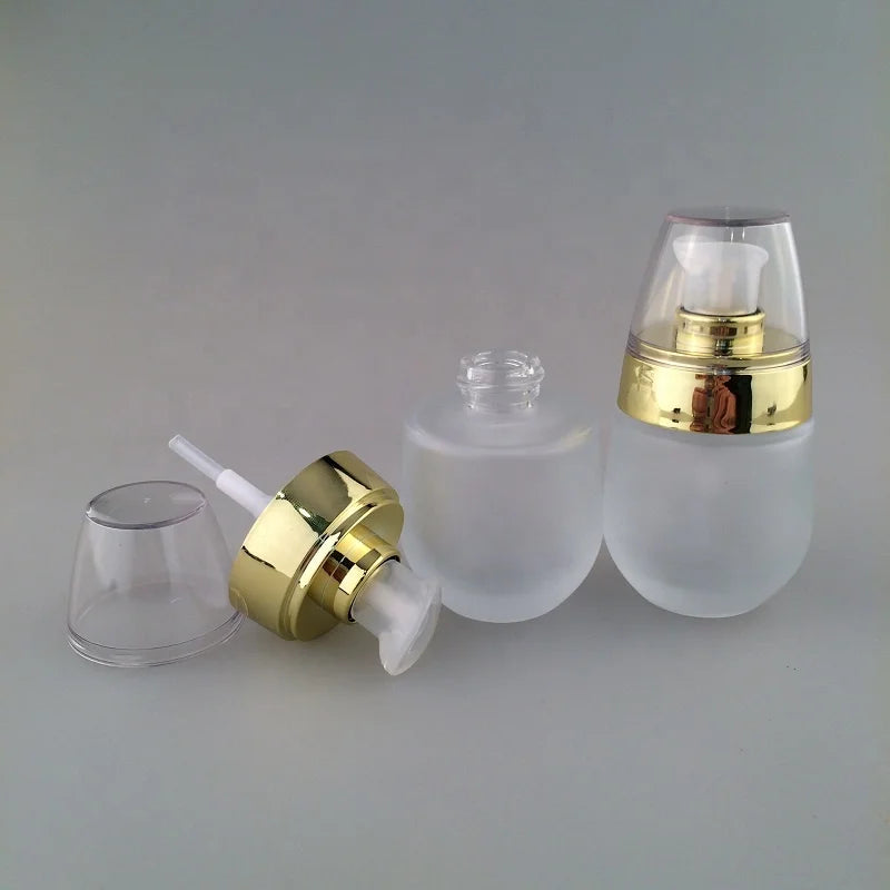 30ml 1oz Clear Frosted Glass Oval Cosmetic Containers Lotion Pump Bottles with Gold Silver Black Cap for Face Cream Skin Care