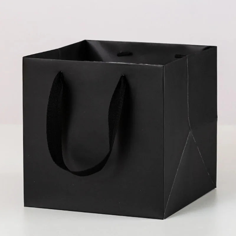 Wholesale Custom Recyclable 250gsm Kraft Paperboard Bags Baking Flower Festival Gifts Square Shape Flexiloop Handle Socks