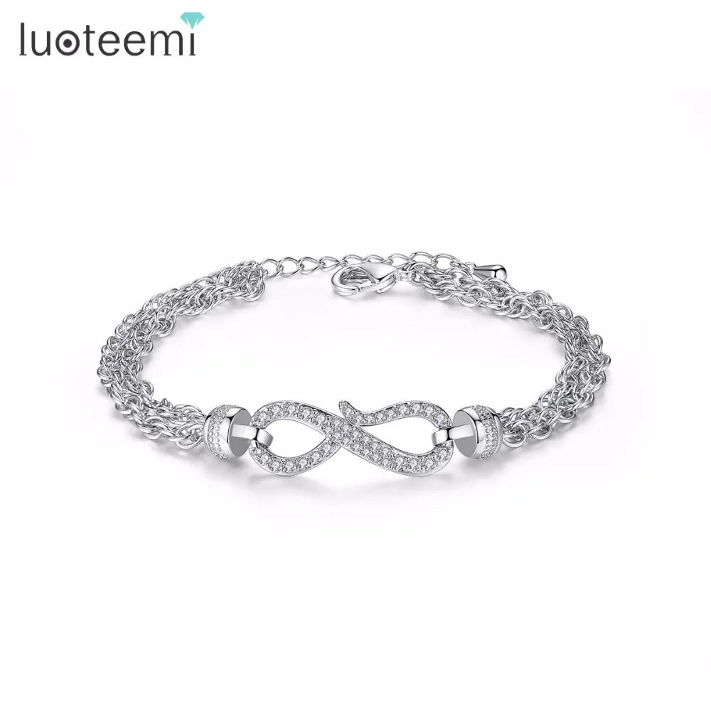 LUOTEEMI Fashion Twist Geometric Bracelet Bangles for Women White Gold-color Crystal CZ Bracelet Party Jewelry Braceleiras Pulse