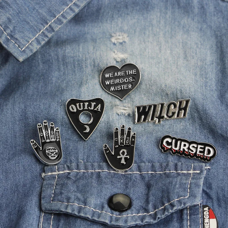 Hot Sale New Style Black Metal Lapel Pins Cheap Wholesale Heart Hollow Out Hand Brooch Custom Letter Metal Black Pin with Witch