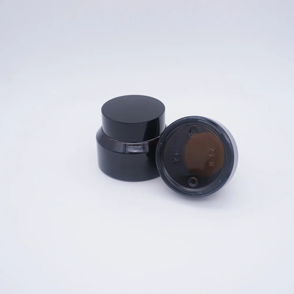1oz Sloping Shoulder Amber Glass Round Jar with Black  Lid