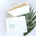 Wholesale OEM White Kraft Fancy Shopping Paper Bag with Handles Custom Logo for Clothing and Shoes