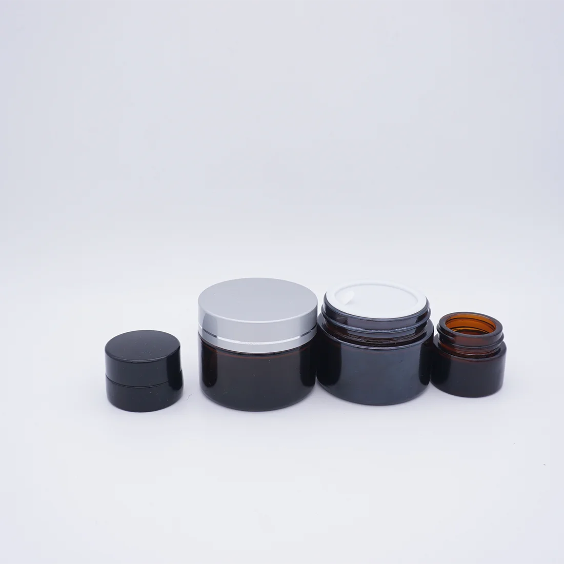 Customized 30g Amber Glass Cosmetic Cream Jar with Black  Lids
