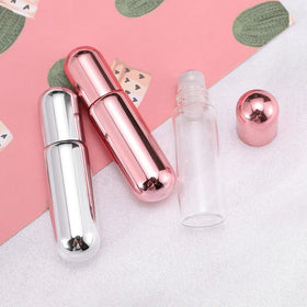 Stock Pink Transparent UV Cover 5ml Round Sample Roll on Ball Frosted Clear Glass Roller Bottle for Essential Oil