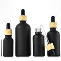 Matt Black Oil Bottles with Bamboo Collar and Black Dropper Lid in 5ml 10ml 15ml 20ml 30ml 50ml 100ml