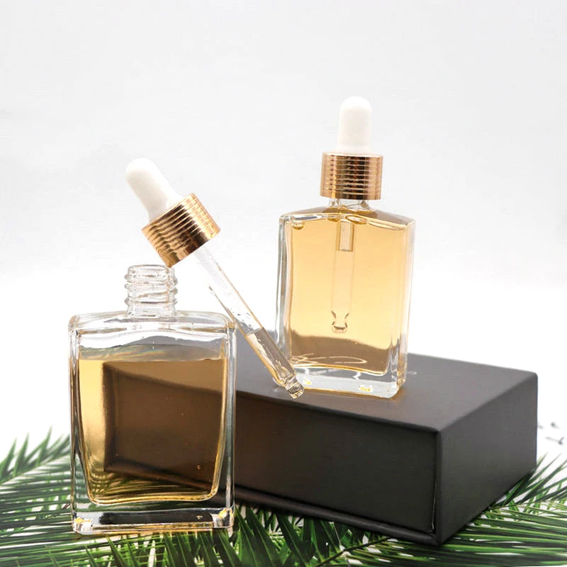 Unique Rectangle Glass Dropper Bottle 30ml/50ml Hair Body Facial Oil Serum Bottle with Screen Printing Flat Square Shaped Box