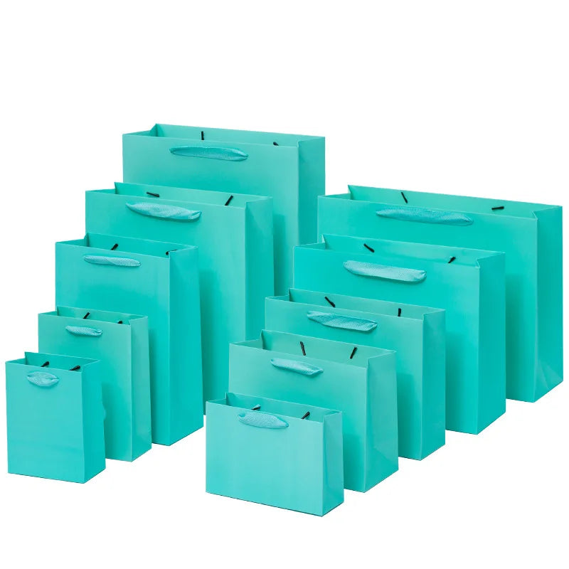 Hotsale Custom Waterproof Green Boutique Luxury Card Paper Recyclable Apparel Packaging Tote Bags for Clothing & Shoes