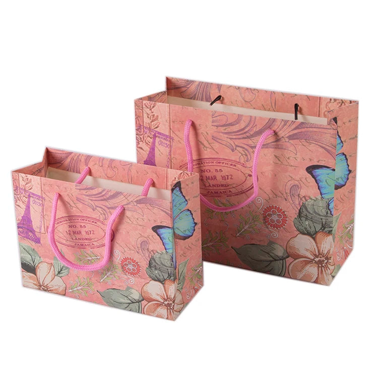 Wholesale Custom logo Printed Luxury Paper Shopping Clothes Gift Packaging Bag with Handle