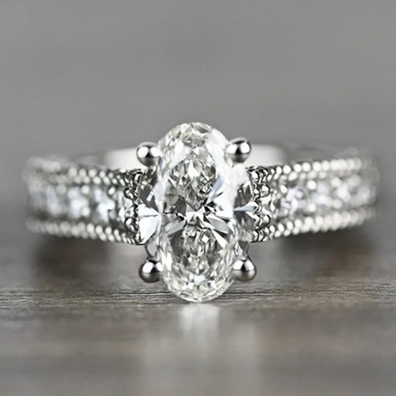 Huitan Custom Women Finger Jewelry Eternity Ring Promise 4 Prong Oval Diamond Cubic Zirconia 925 Silver Color Wedding Ring