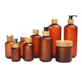 Wholesale Frosted Amber 150ml 200ml 250ml 300ml Plastic Bottles Pet Amber Bottles With Bamboo Lid