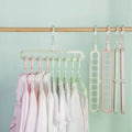 High Quality Rotatable Nine-hole Multi-unctional Plastic Clothes Hanger for Home Storage
