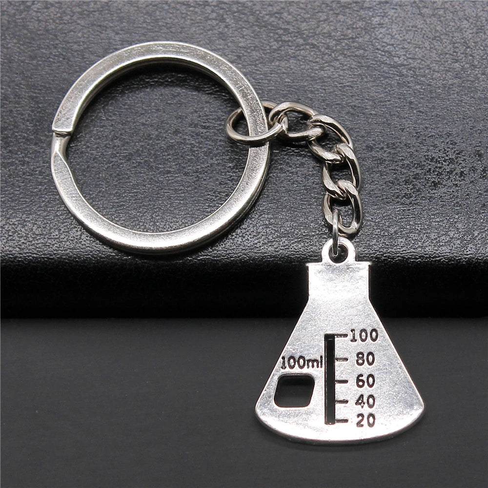 WYSIWYG 26x21mm Zinc Alloy Antique Silver Plated Chemical Instrument Graduate Key Chain Souvenirs Gift for Women P1-ABD-C12627