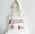 Personalized Blue Cotton Tote Bag with White Logo Zipper Closure for Packaging Usage