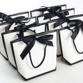 Custom Design Luxury Gift Shopping Paperboard Bags with Your Logo Ribbon Bow Tie for Jewelry & Watch