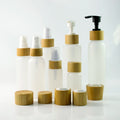 Wholesale PET Cosmetic Bottle Bamboo Spray Pump Cap 30ml 50ml 150ml Essential Oil Perfume Empty PE Plastic for Shampoo Lotion