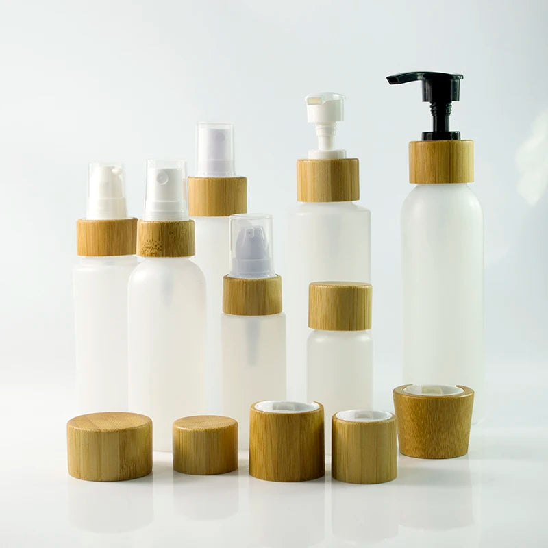 Wholesale PET Cosmetic Bottle Bamboo Spray Pump Cap 30ml 50ml 150ml Essential Oil Perfume Empty PE Plastic for Shampoo Lotion