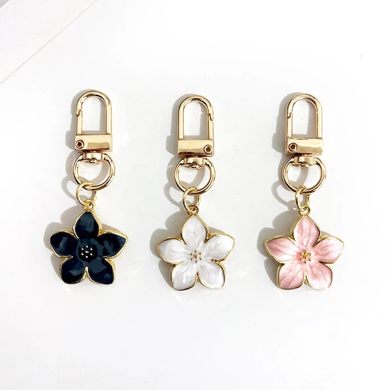 Dainty White Black Pink Metal Key Bag Charm Enamel Sakura Flower Keychain Accessory for Women