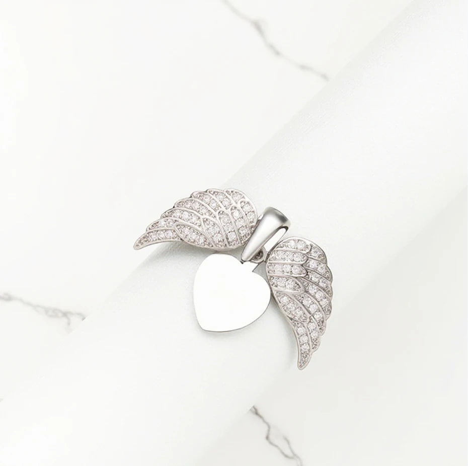 Sterling Silver Angel Wing Drop Earrings for Women CZ Inlay Religious Charm Jewelry with Rhodium Plating and Classic Style