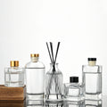 Wholesale Luxury Clear Glass for Reed Diffuser Bottle 50ml 100ml 200ml 150ml Sizes with Custom Seal Screw Cap Packaged in Carton