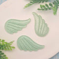 100pcs Shiny Resin Glitter Wing Flatback Scrapbooking Cabochons Crafts Miniature Art Supply Home Decor DIY Accessories 22*40mm