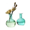 Wholesale Nordic Green Glass Bottle Vases Round Small Glass Bud Vase for Cafe and Restaurant Table Decoration