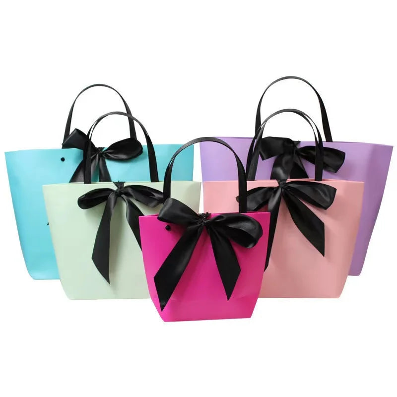 Rivet Handle Paper Bags Luxury Packaging Gift Bags Custom Shopping Paper Bags With Ribbon Bow Tie