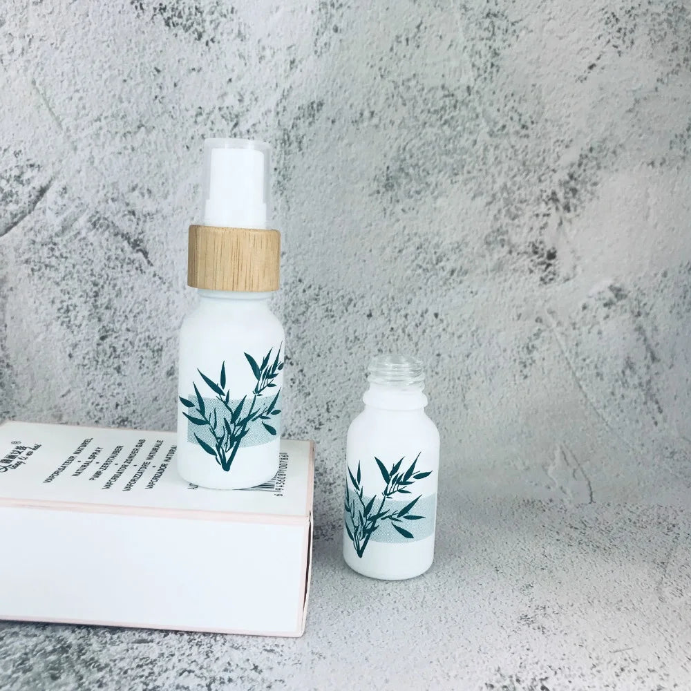 Wholesale 15ml Matte White Spray Glass Bottle with Real Wood Bamboo Spray Lid Cap