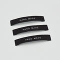 China Wholesale Custom Logo Hand Made Item Woven Neck Labels High Density Fabric Clothing Labels Pegatinas Y Etiquetas