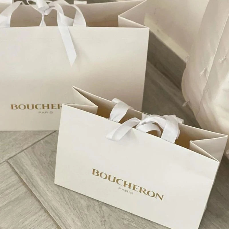 Custom Recycled Ivory Clothes Packaging Gift Bag With Ribbon Handle Luxury Cream Beige Shopping Paper Bags With Your Own Logo