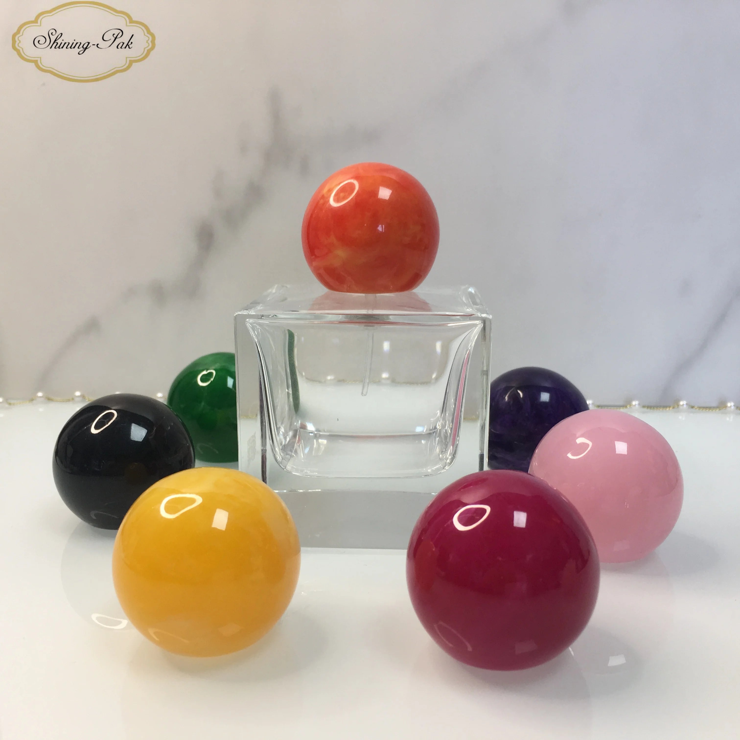 Manufacturer Wholesale Oem Round Stone Shaped Marbled Resin Luxury Perfume Bottle Cap Perfume Lids
