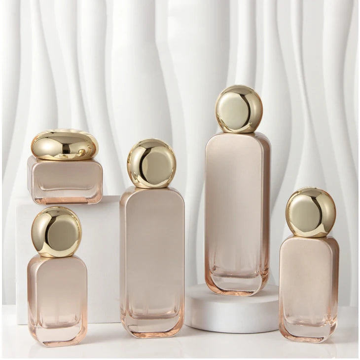 New Skincare Product Packaging Gradient Orange Glass Bottle with Pump Water-in-cream Essence Liquid Set Glass Dispensing Bottle