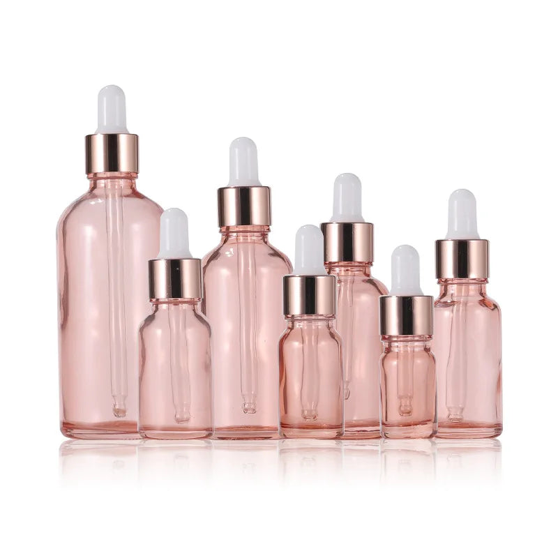 Custom Translucent Rose Gold Pink Glass Dropper Bottle Empty Essential Oil 5ml 100ml Dropper Cap Sizes for Custom Essential Oil