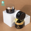 YAN Packaging Custom Logo 50g Black Reusable Glass Jar with White Gold Cap PP Gasket Body Butter Cosmetic Jar for Skin Care