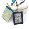 YIXINNIAN NATIONAL PU Leather Rotatable Reel Badge Business Card Holder with Letter Pattern Long Band Lanyard for Work Daily Use