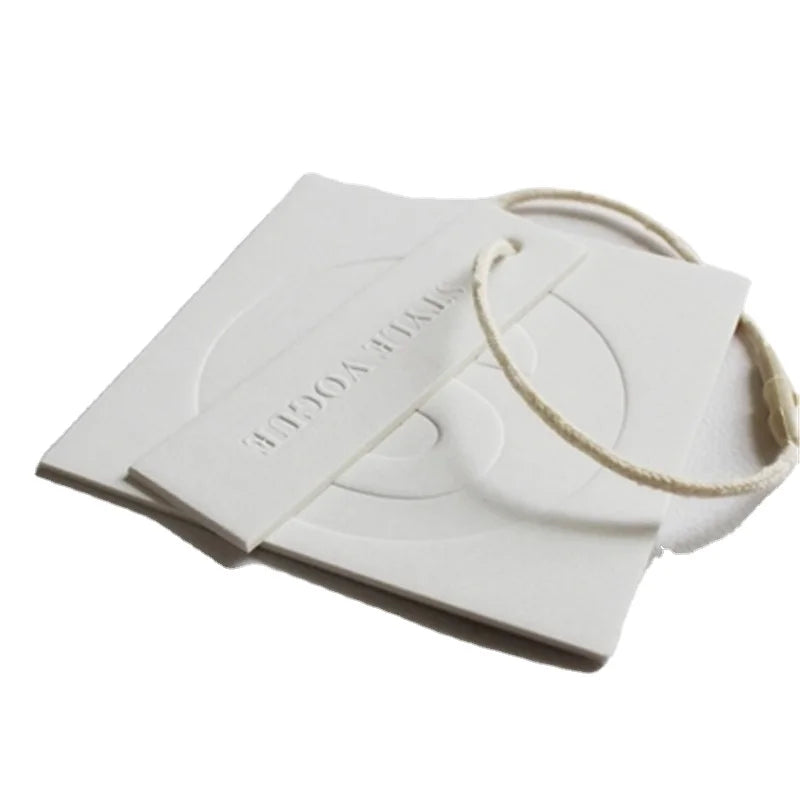 Factory Wholesale New Cheap Garment Paper Tag Emboss logo Clothing Tag hang Tag for Garment