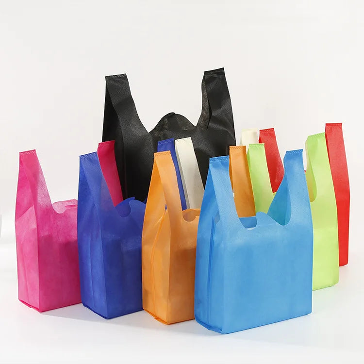 Wholesale Eco-Friendly Custom Cheap Non Woven Bag t Shirt Non Woven Vest Bag for Supermarket Biodegradable Recycle Non Woven Bag