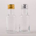 Low Price 30ml 1oz.clear Mini Glass Bottle with Screw Cap for Beverage Olive Oil