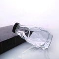 Irregular Geometry Shaped Clear Super Flint Glass Fruit Juice Home Cold Brew Liquor Bottle 350ml 12oz with Custom Twist-off Lid