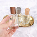 Wholesale Cheap Price clear Color 30ml 50ml Man Women Cosmetic Glass Spray Wood Perfume Bottle Cap