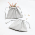 Custom Emboss Logo Gray Faux Leather Travel Cosmetic Dust Pouch High End Drawstring Pu Leather Gift Makeup Cosmetic Bag