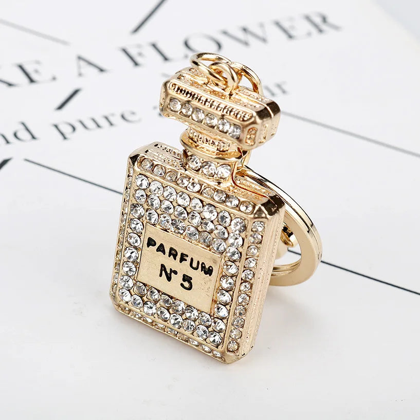 New Fashion Pearl Wristband Key Chain Creative Rhinestone Perfume Bottle Bow Keychain Female Cute Car Key Bag Pendant