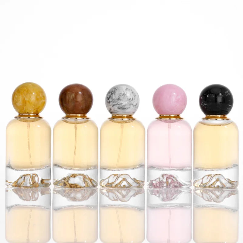 Luxury 50ml New Design Color Translucent Wholo Sale Unique Dome Parfum Bottle Empty Round Atomizer Perfume Bottle With Wood Bal