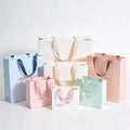 Custom White Cardboard Gift Bag Embossing Underwear Candles Photo Frames Available Art Paper Coated Paper Options