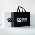 Christmas Non Woven Gift Bag Custom Printed Holiday Shopping Tote Bag Eco Friendly Reusable Fabric Bag for Festive Promotion