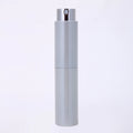 Wholesale Custom Color 10ml Round Twist up Refillable Perfume Atomizer with Glass Inner Bottle