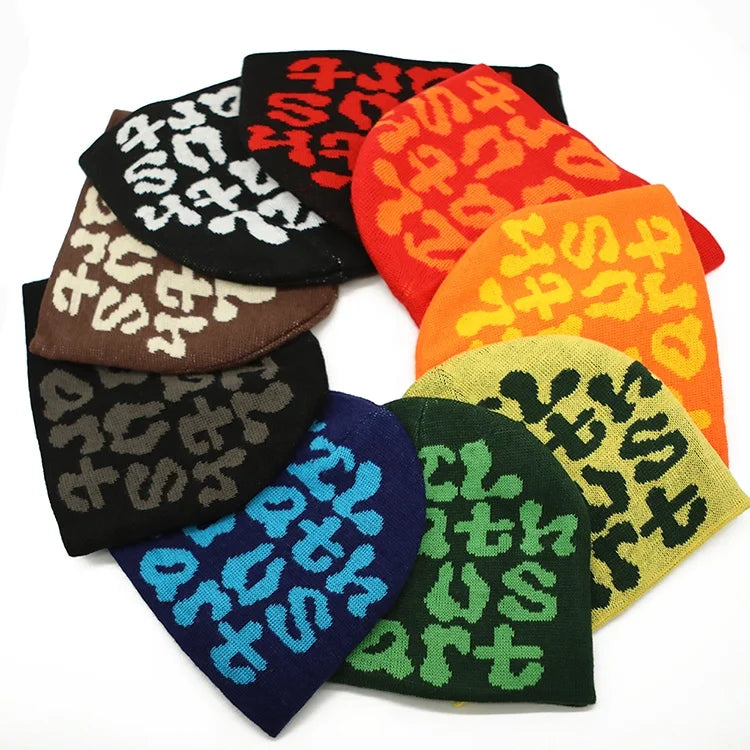 Low MOQ Custom Logo Jacquard Common Beanie Cuffless Winter Skull Cap Knit Hat with Letter Pattern for Beach Wear Wholesale